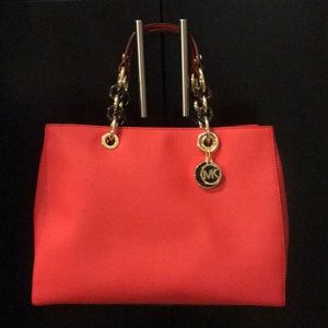 Like new Michael Kors orange handbag